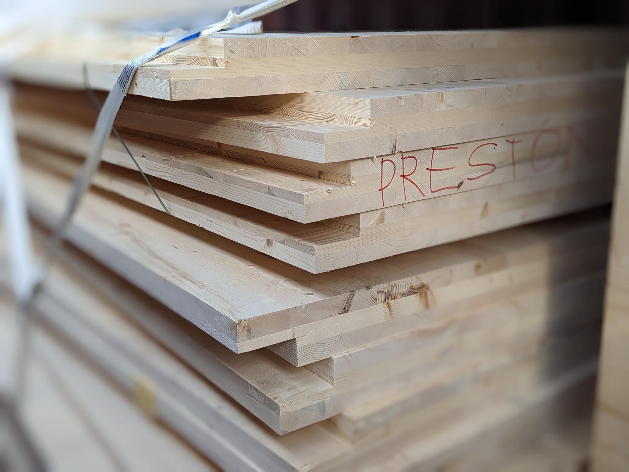 CLT wall panels ready for transport to site
